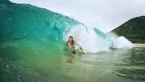 Man Surfing a Wave